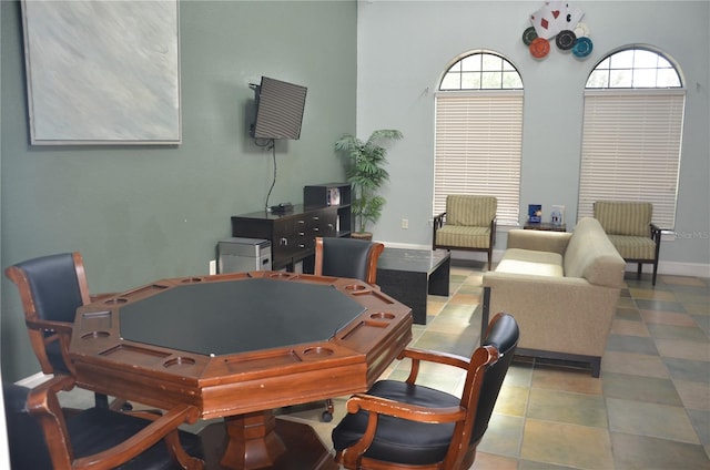 playroom featuring a high ceiling