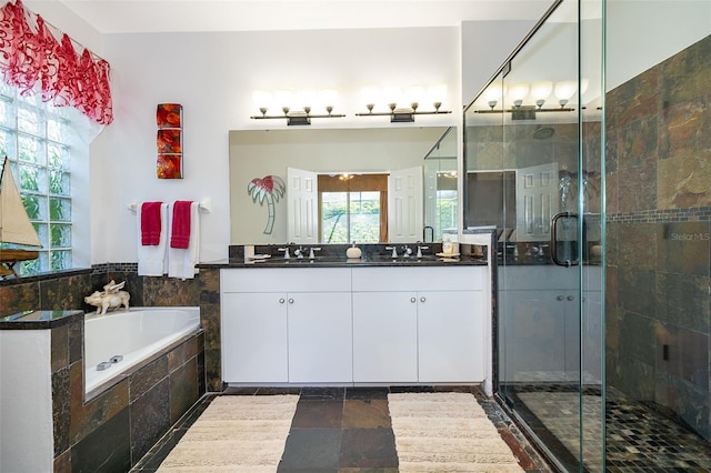 bathroom with plus walk in shower and vanity