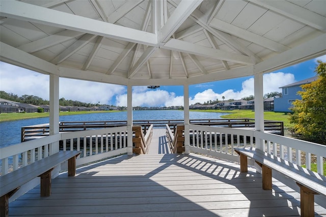 view of dock with a water view and a gazebo