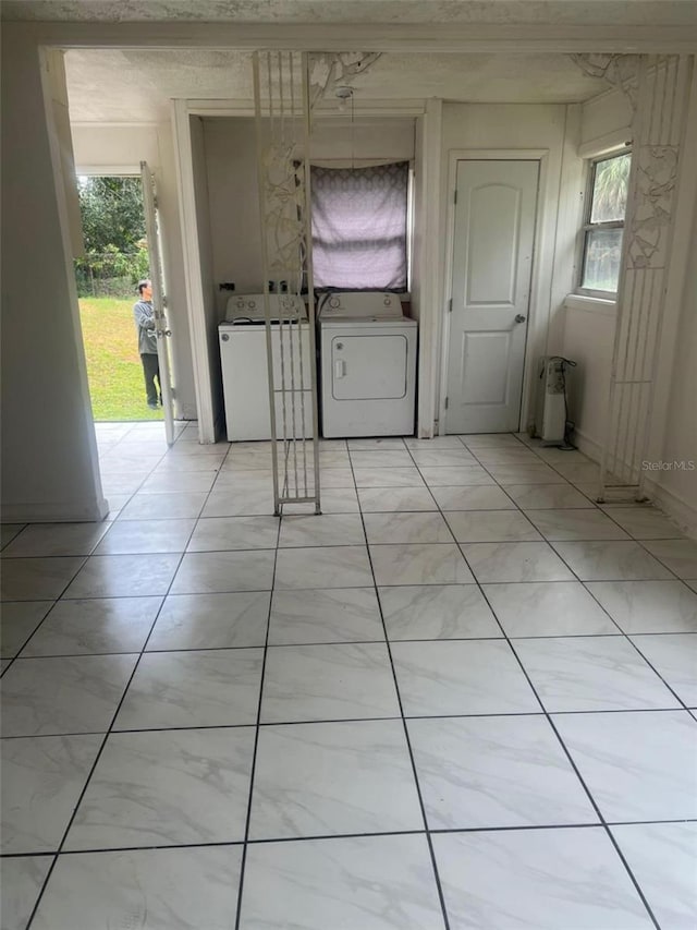 washroom featuring washer / clothes dryer