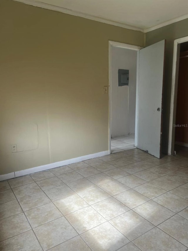 spare room featuring ornamental molding