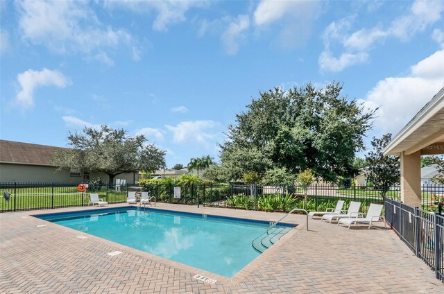 view of pool with a patio area