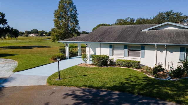 exterior space with a front lawn