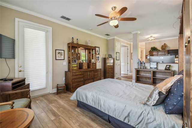 bedroom featuring ceiling fan, light hardwood / wood-style flooring, and crown molding