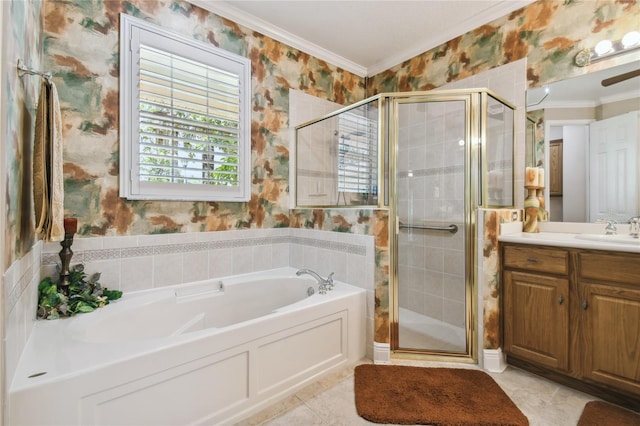 bathroom featuring vanity, shower with separate bathtub, crown molding, and tile patterned flooring