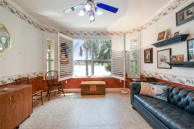 interior space featuring crown molding and ceiling fan