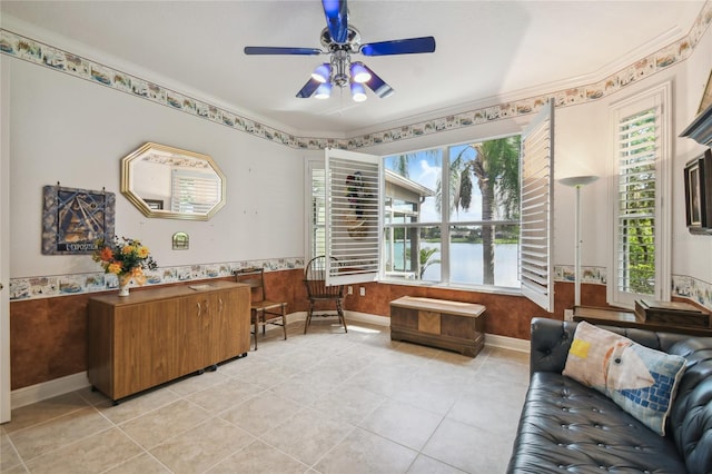 office with ceiling fan, light tile patterned flooring, plenty of natural light, and ornamental molding