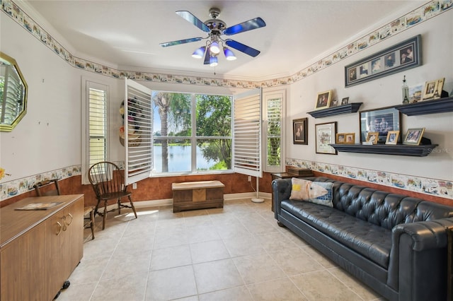 living room with ceiling fan and light tile patterned floors