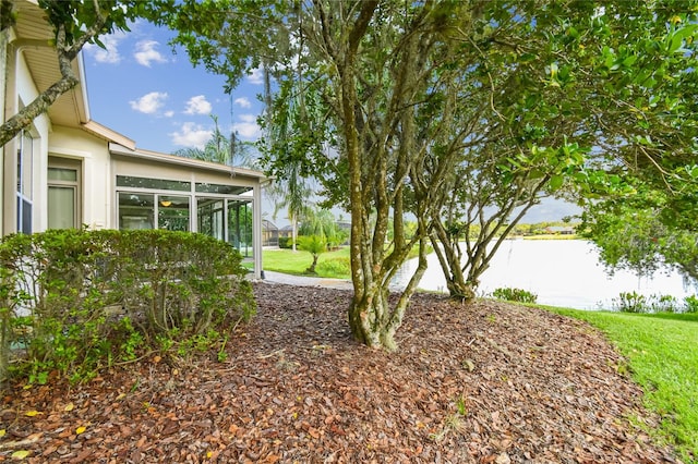 view of yard with a sunroom