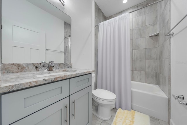 full bathroom featuring vanity, toilet, tile patterned floors, and shower / bath combo with shower curtain