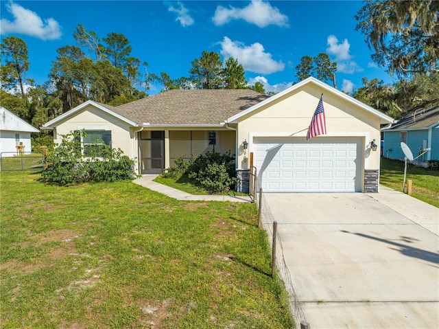 ranch-style house with fence, concrete driveway, a front yard, stucco siding, and a garage