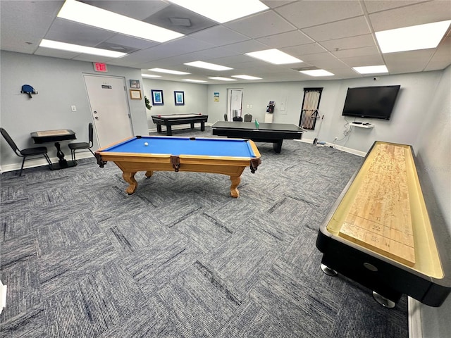 recreation room with dark carpet, billiards, and a drop ceiling