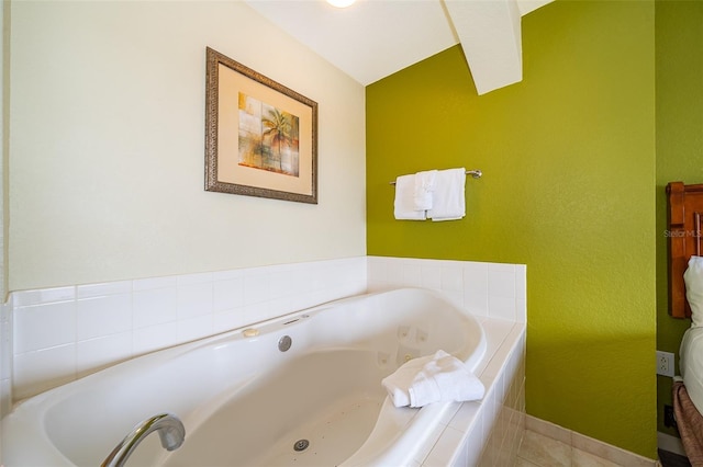 bathroom featuring a relaxing tiled tub