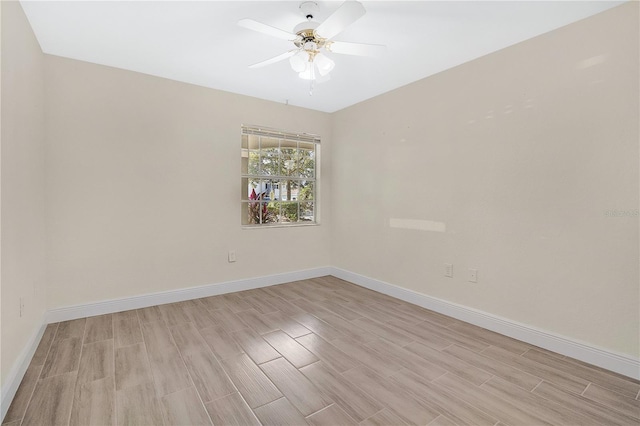 unfurnished room featuring ceiling fan and light hardwood / wood-style floors