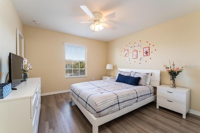 bedroom featuring ceiling fan and dark wood-type flooring