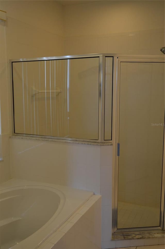 bathroom with plus walk in shower