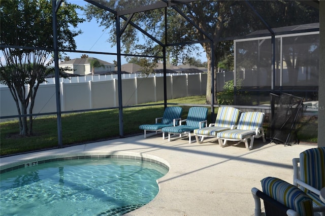 view of pool featuring a lanai and a patio area