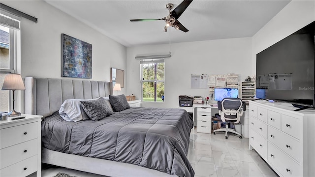 bedroom featuring ceiling fan