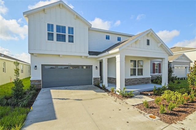 view of front of property featuring a garage