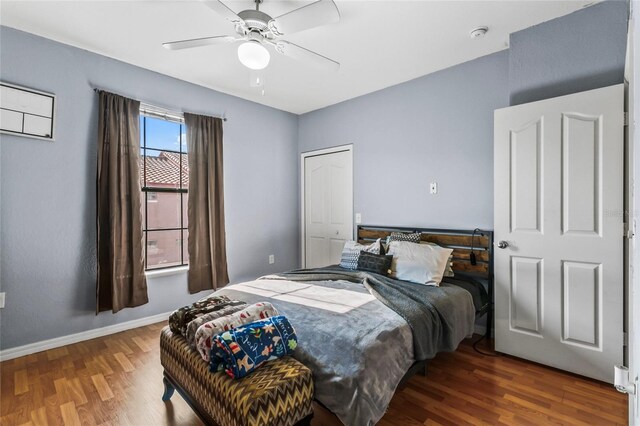 bedroom featuring hardwood / wood-style flooring and ceiling fan