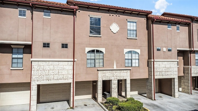 view of property featuring a garage