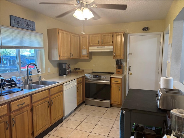 kitchen with light tile patterned flooring, stainless steel electric range, a textured ceiling, and dishwasher