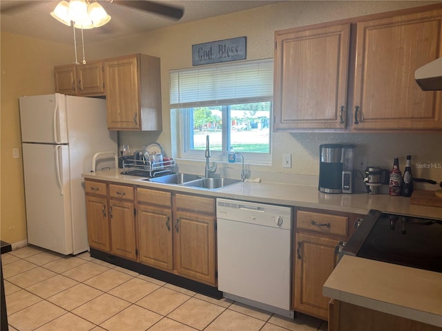 kitchen with ceiling fan, sink, white appliances, and light tile patterned flooring