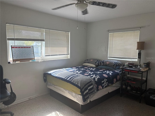 bedroom featuring ceiling fan