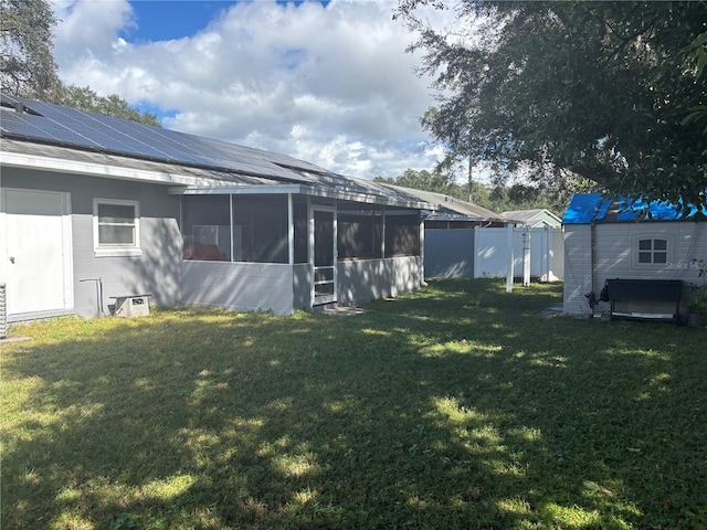 view of yard featuring a sunroom