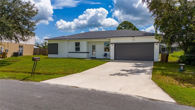 single story home with a front yard, a garage, and central AC unit