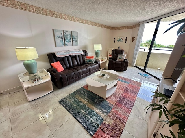 living room with tile patterned flooring and a textured ceiling