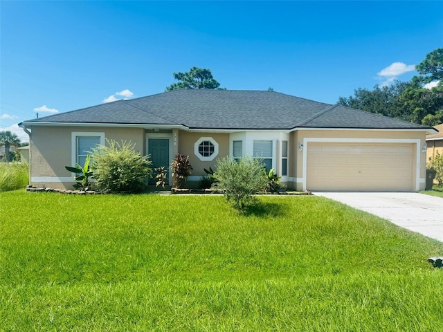 ranch-style home featuring a garage and a front lawn