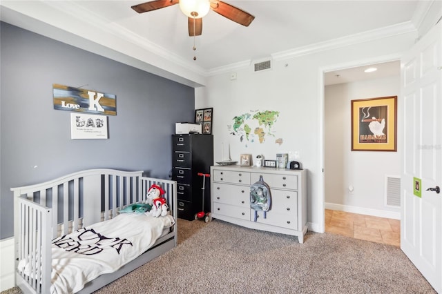 bedroom with crown molding, ceiling fan, and light colored carpet