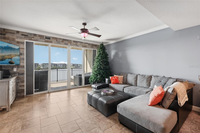 living room with a textured ceiling, ceiling fan, and crown molding