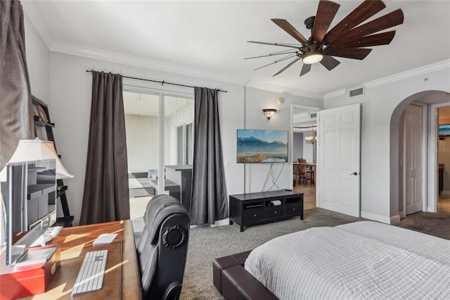 bedroom with carpet floors, ornamental molding, and ceiling fan