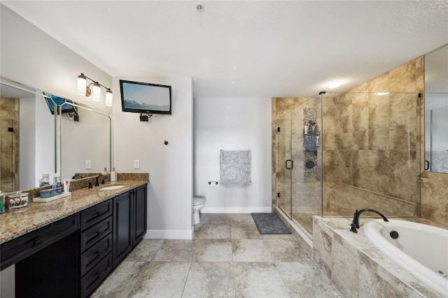 full bathroom with vanity, toilet, and separate shower and tub