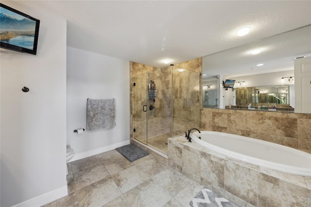 bathroom featuring separate shower and tub and toilet