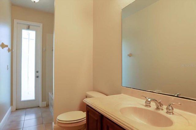 3757 Eagle Isle Cir, Kissimmee, FL 34746 - bathroom featuring a tub to relax in, toilet, tile patterned floors, and vanity