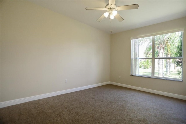 carpeted empty room with ceiling fan