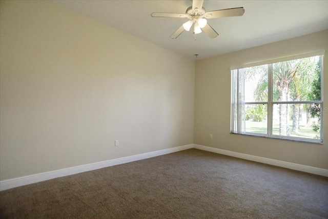 3757 Eagle Isle Cir, Kissimmee, FL 34746 - carpeted spare room featuring baseboards and a ceiling fan