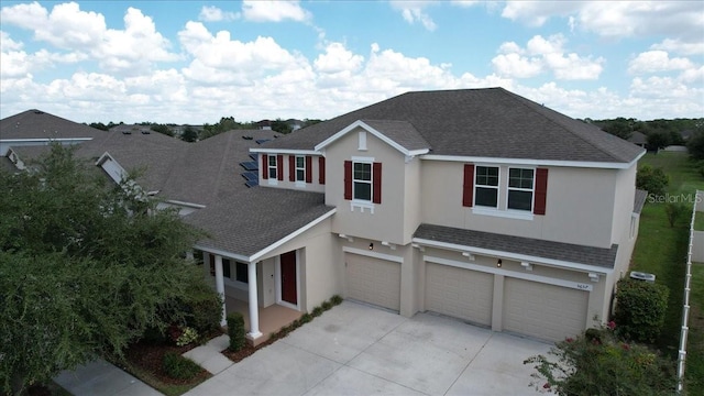 front of property with a garage