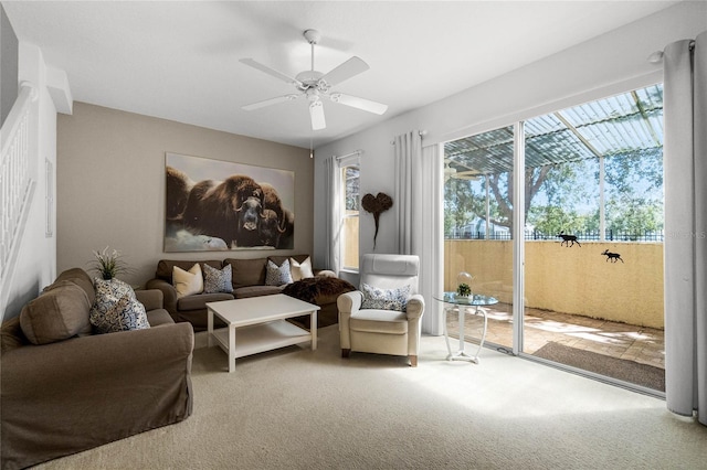 1256 S Beach Cir, Kissimmee, FL 34746 - carpeted living room with a ceiling fan