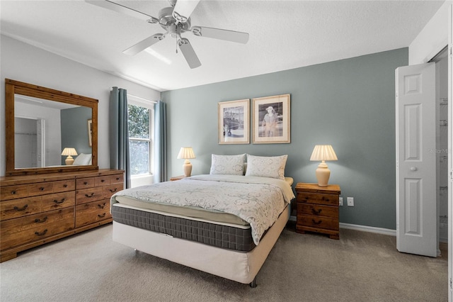 1256 S Beach Cir, Kissimmee, FL 34746 - bedroom featuring baseboards, ceiling fan, and carpet floors