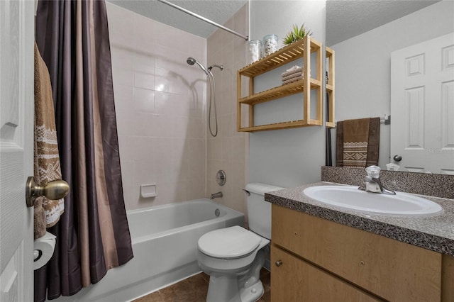 full bathroom with vanity, a textured ceiling, tile patterned floors, toilet, and shower / tub combo with curtain