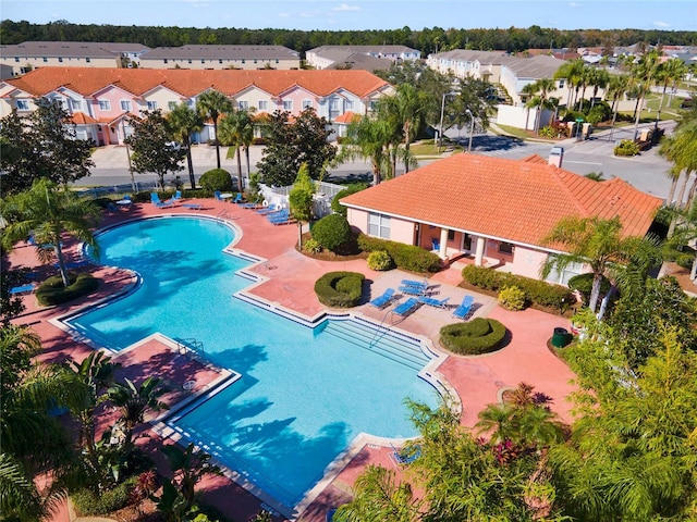 1256 S Beach Cir, Kissimmee, FL 34746 - community pool with a residential view and a patio area