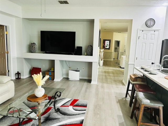 living room featuring light hardwood / wood-style floors