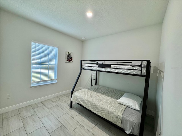 bedroom with a textured ceiling