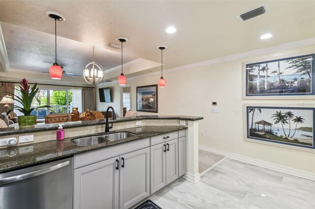 kitchen with dishwasher, decorative light fixtures, sink, and dark stone counters