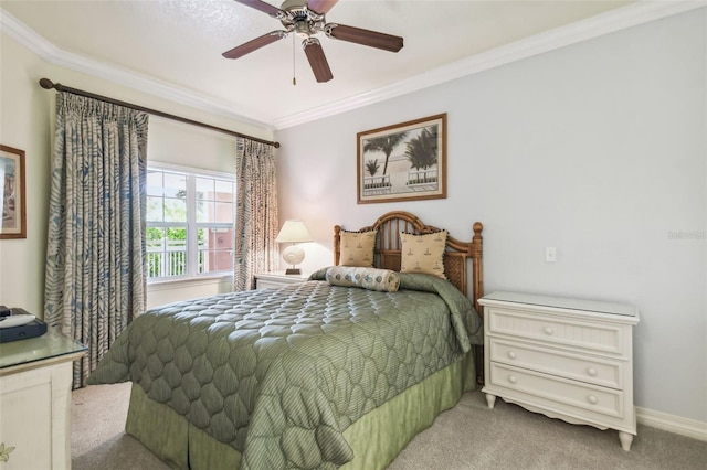 bedroom with ceiling fan, light carpet, and ornamental molding