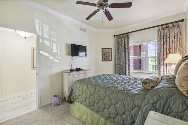 bedroom with ornamental molding, light carpet, and ceiling fan